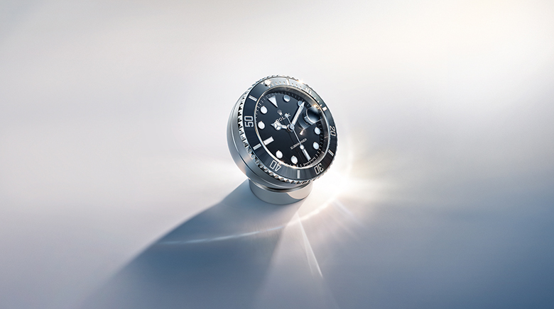 Rolex desk clock with Chromalight display that emits an intense blue glow in the dark.
