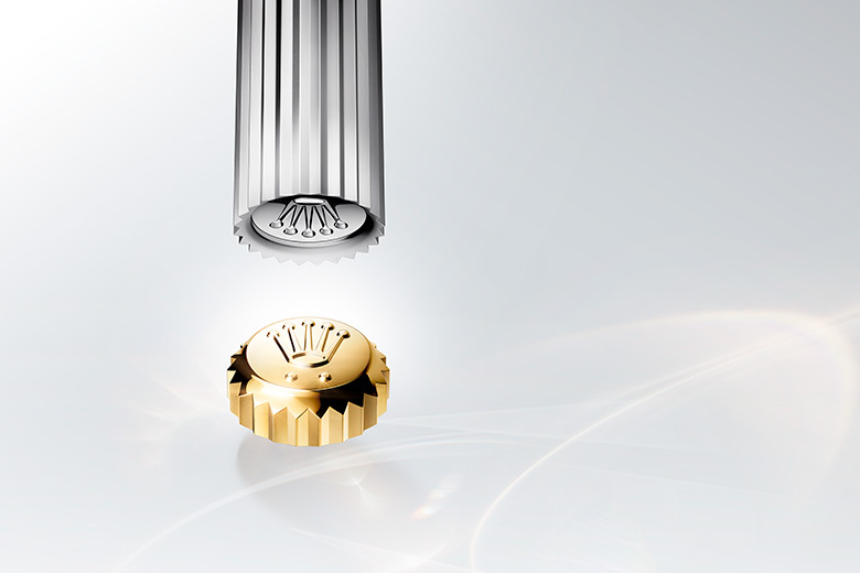 Rolex coronet logo on winding wheel