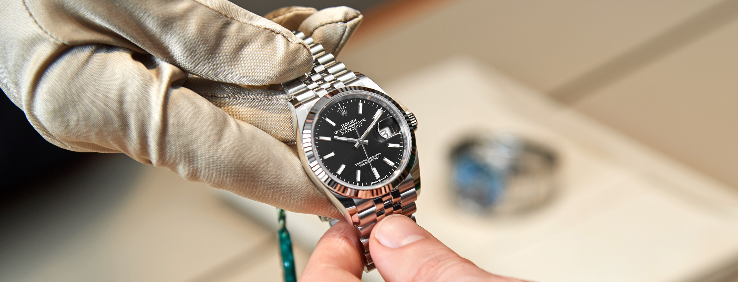 Handover of rolex watch to client