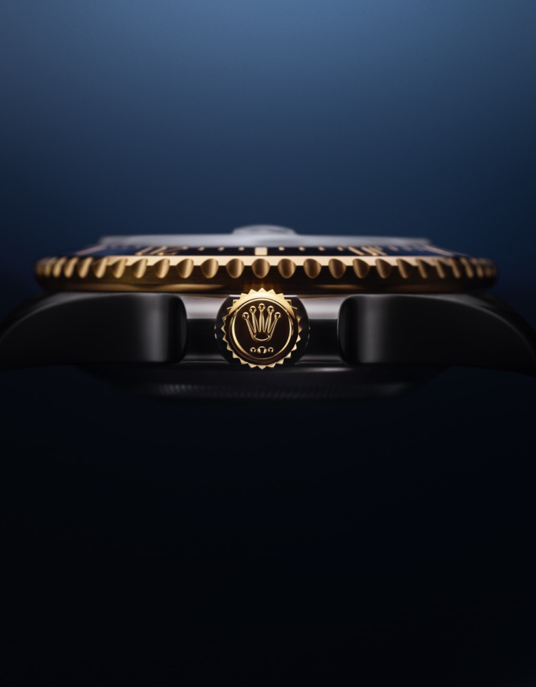 Rolex Sea-Dweller Oyster, yellow gold Winding crown with Rolex coronet logo